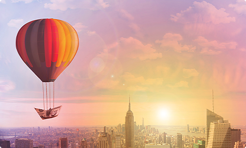 창의미래융합대학원 비주얼 이미지 - 열기구가 높이 떠있으며 멀리 태양이 아름답게 빛나고 있음.